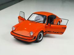 Xe mô hình Porsche 911 3.0 Carrera Orange 1977 1:18 Solido (Cam)