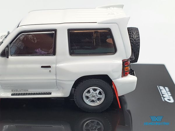 Xe Mô Hình Mitsubishi Pajero Evolution White With Extra Wheels 1:64 Inno Model (Trắng)