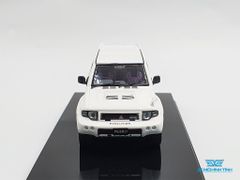 Xe Mô Hình Mitsubishi Pajero Evolution White With Extra Wheels 1:64 Inno Model (Trắng)