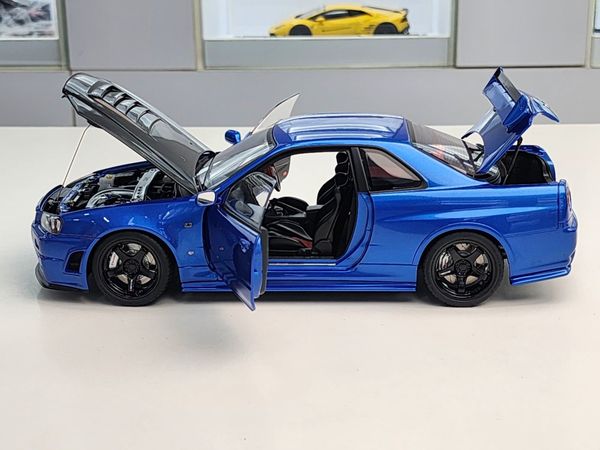 Xe Mô Hình NISMO R34 GT-R Z-tune 1:18 AUTOart ( BAYSIDE BLUE W/ CARBON BONN... )