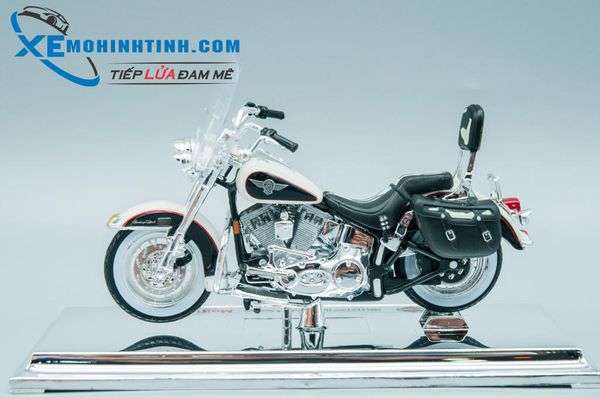 XE MÔ HÌNH HARLEY DAVIDSON 1993 FLSTN Heritage Softail 1:18 MAISTO (TRẮNG ĐEN)