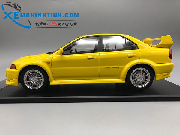 Xe Mô Hình Mitsubishi Lance Evolution V 1:18 Tarmac Works (Vàng)