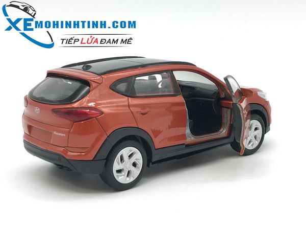 HỘP XE MÔ HÌNH Hyundai Tucson WELLY 1:36 (Cam )