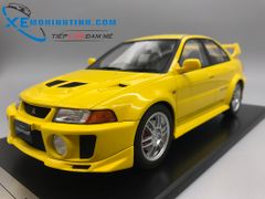 Xe Mô Hình Mitsubishi Lance Evolution V 1:18 Tarmac Works (Vàng)