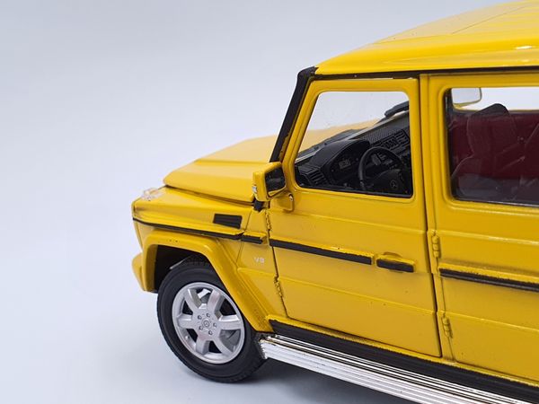 XE MÔ HÌNH MERCEDES-BENZ G55 1:24 WELLY-FX (VÀNG)