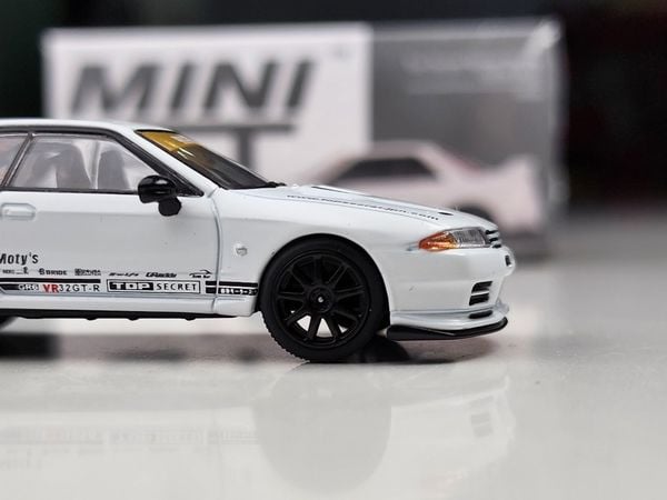 Xe mô hình Nissan Skyline GT-R (R34) V-Spec N1 White RHD 1:64 MiniGT ( Trắng )