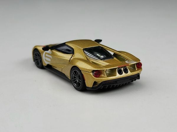 Xe Mô Hình Ford GT Holman Moody Heritage Edition LHD 1:64 MiNiGT ( Vàng Đồng )