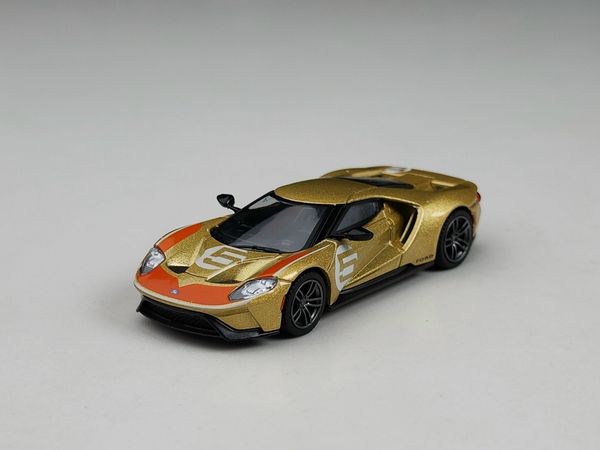 Xe Mô Hình Ford GT Holman Moody Heritage Edition LHD 1:64 MiNiGT ( Vàng Đồng )