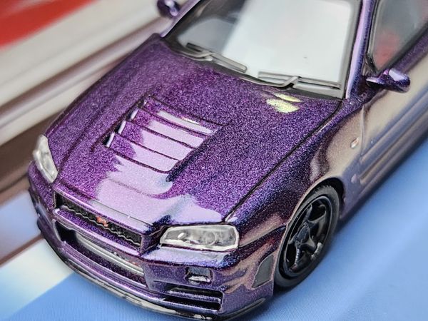 Xe Mô Hình Nismo R34 GT-R Z-Tune 1:64 Tarmac Works ( Tím )