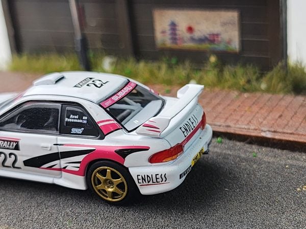 Xe Mô Hình Subaru Impreza WRC98 1999 Rally Tour De 1:64 MiniGT ( Corse #22 LHDD )