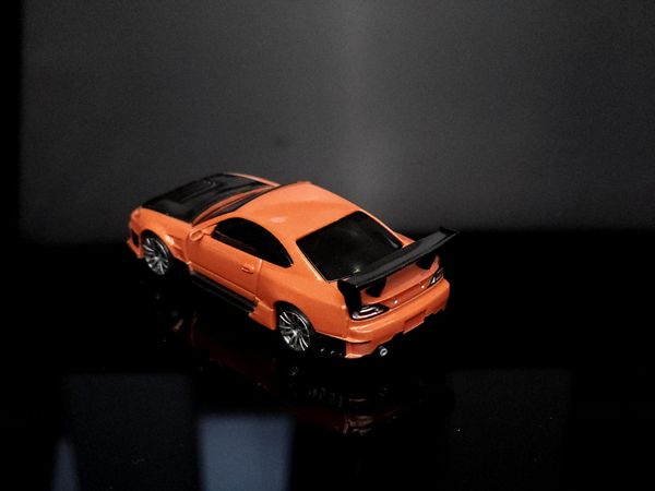 Xe Mô Hình Nissan Silvia S15 D-MAX 1:64 MiniGT ( Metallic Orange RHD )