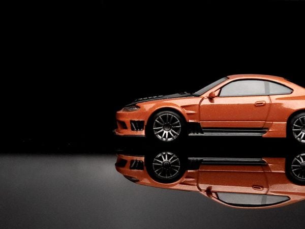 Xe Mô Hình Nissan Silvia S15 D-MAX 1:64 MiniGT ( Metallic Orange RHD )