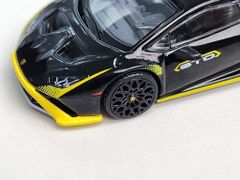 Xe Mô Hình Lamborghini Huracan STO Nero Noctis LHD 1:64 MiniGT ( Đen Viền Vàng )