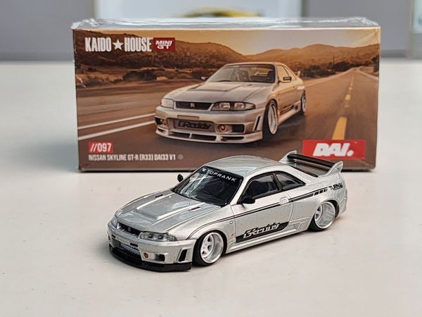 Xe Mô Hình Nissan Skyline GT-R R33 Dai33 V1 1:64 Kaido ( Bạc )