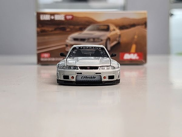 Xe Mô Hình Nissan Skyline GT-R R33 Dai33 V1 1:64 Kaido ( Bạc )