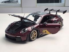 Xe Mô Hình PORSCHE 911 (992) GT3RS – 2023 – PURPLE W GOLD WHEELS 1:18 MINICHAMPS