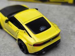Xe Mô Hình Nissan Z Pandem Ikazuchi 1:64 MiniGT (Vàng)