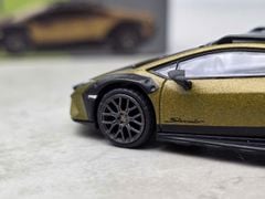 Xe Mô Hình Lamborghini Huracan Sterrato Verde Gea Matt 1:64 MiniGT ( xanh )
