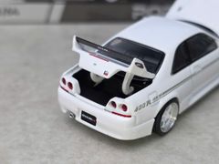 Xe Mô Hình Nissan GT-R R33 Nismo 400R 1:64 PopRace ( White )