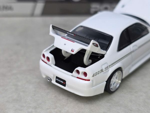 Xe Mô Hình Nissan GT-R R33 Nismo 400R 1:64 PopRace ( White )