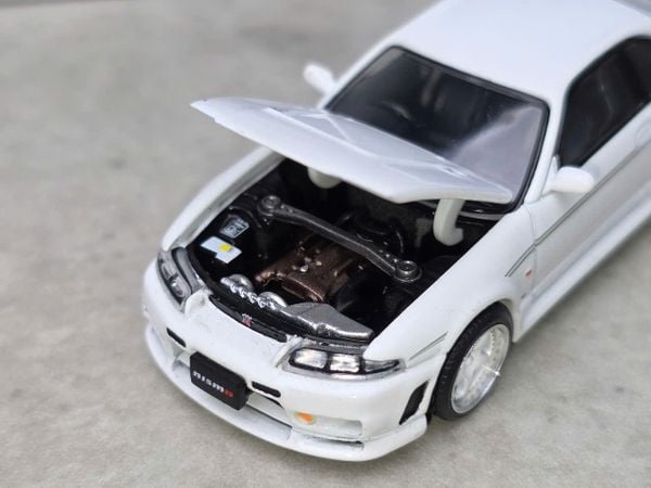 Xe Mô Hình Nissan GT-R R33 Nismo 400R 1:64 PopRace ( White )