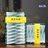 Hai hộp nham trà lão tùng thủy tiên hộp 170g trừng bày trên bàn