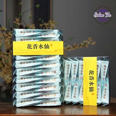 Hai hộp nham trà lão tùng thủy tiên hộp 170g trừng bày trên bàn
