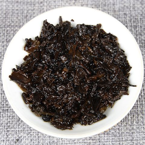 Trà phổ nhĩ chín Băng Đảo Vân Nam năm 2012 bánh 100g