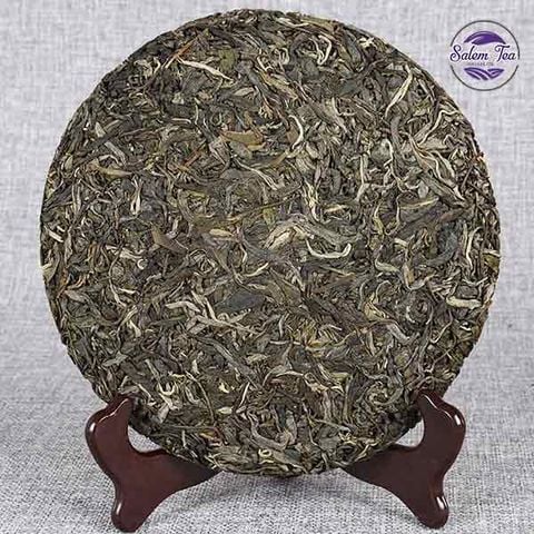 “Mặt trước bánh trà phổ nhĩ sống Băng Đảo cổ thụ năm 2018 với thiết kế truyền thống, chất lượng cao”