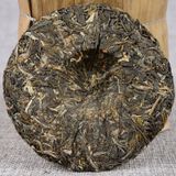 Trà phổ nhĩ sống Băng Đảo Vân Nam năm 2012 bánh 100g