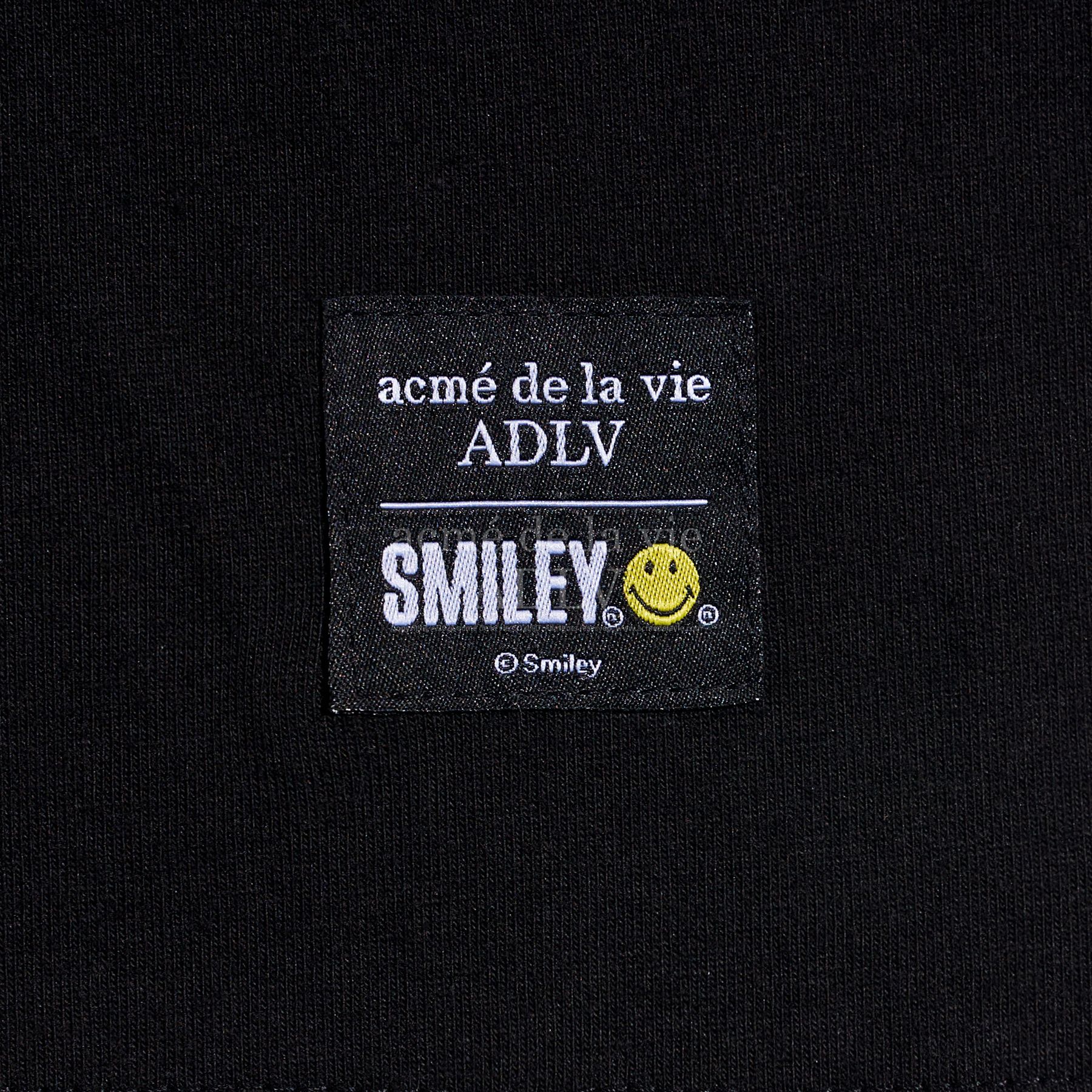  Áo thun - Acmé de la vie X Smiley® - TRAVEL THAT BEGINS SHORT SLEEVE T-SHIRT BLACK 