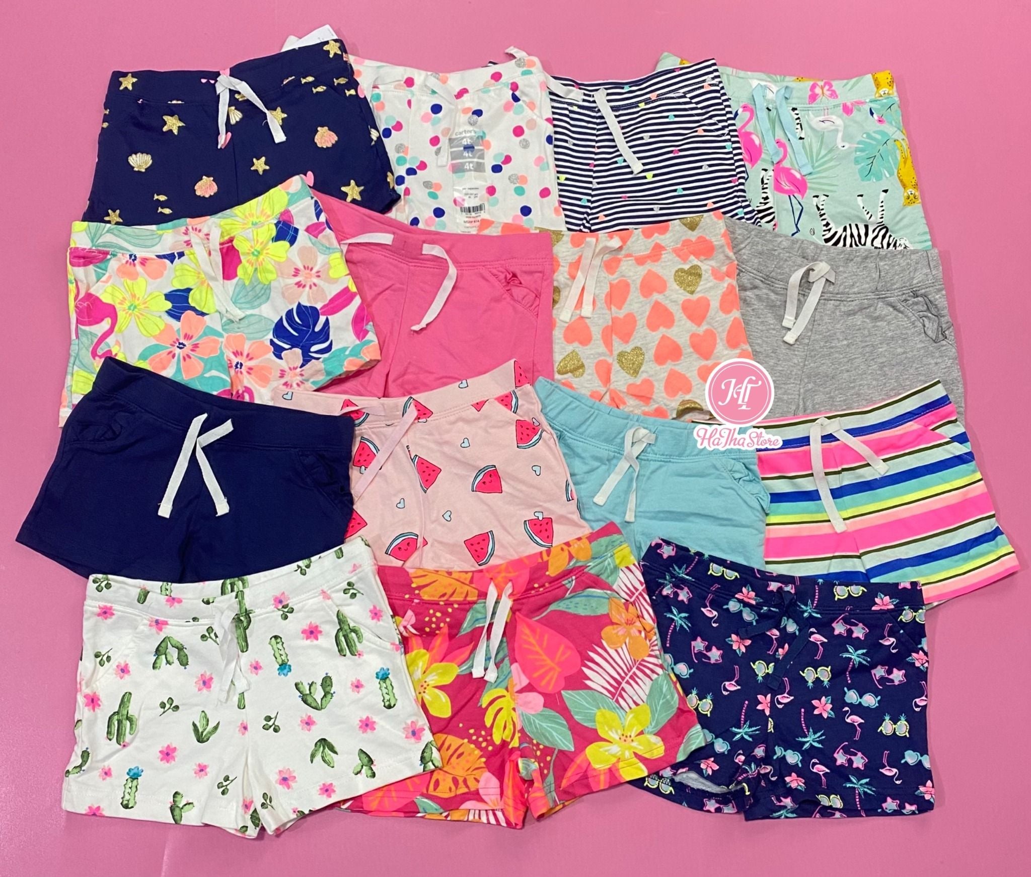  Quần short thun Carter sọc trái tim bé gái 