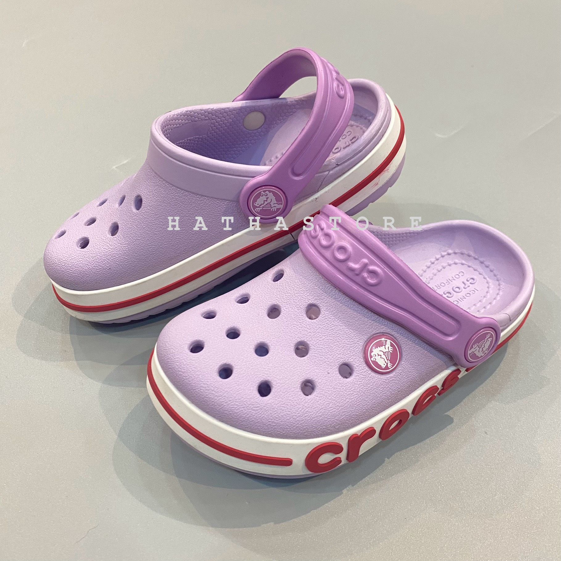  Dép CR0CS tím viền chữ bé gái trai 