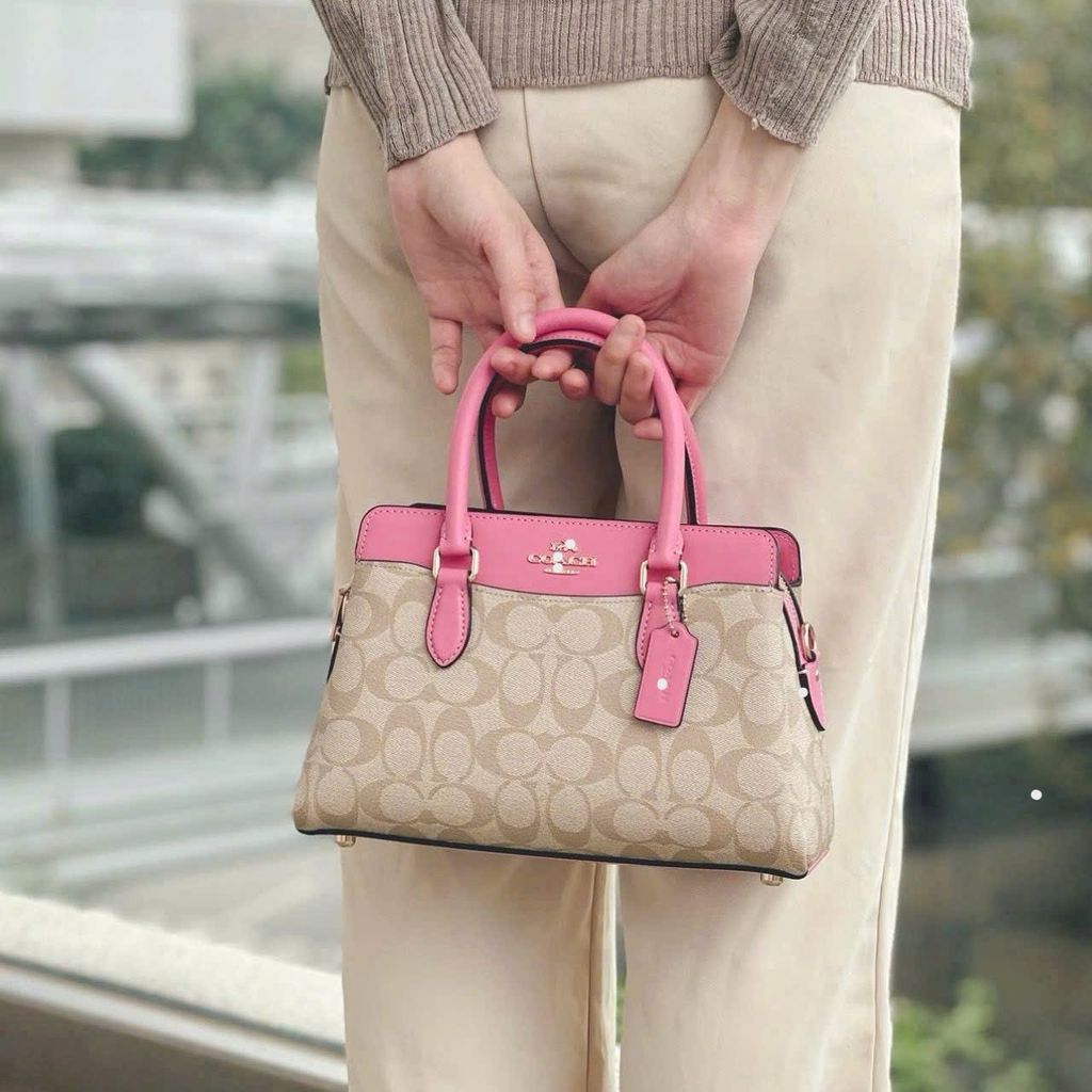 Túi Coach viền Hồng mã C2612H