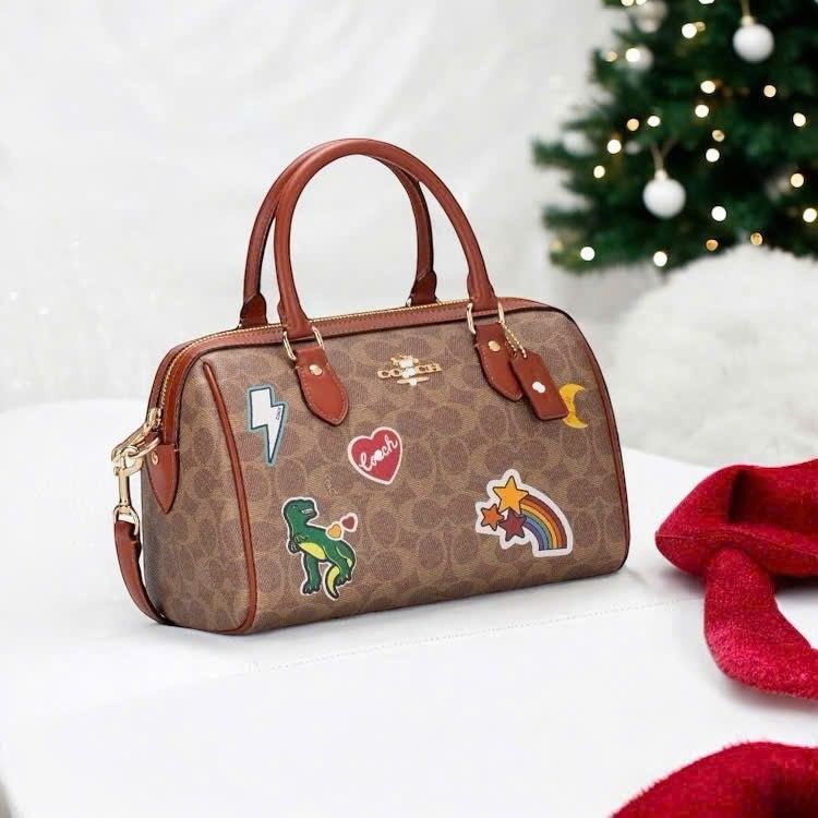 Túi Coach trống nâu in hình