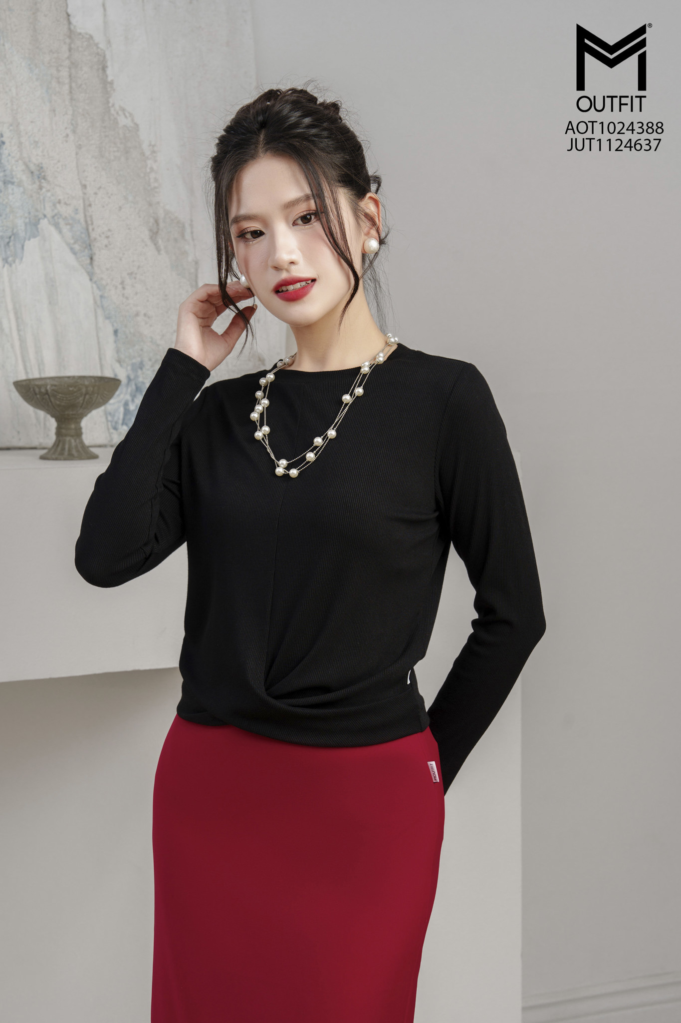 Áo thun dài tay nữ cổ vặn xoắn