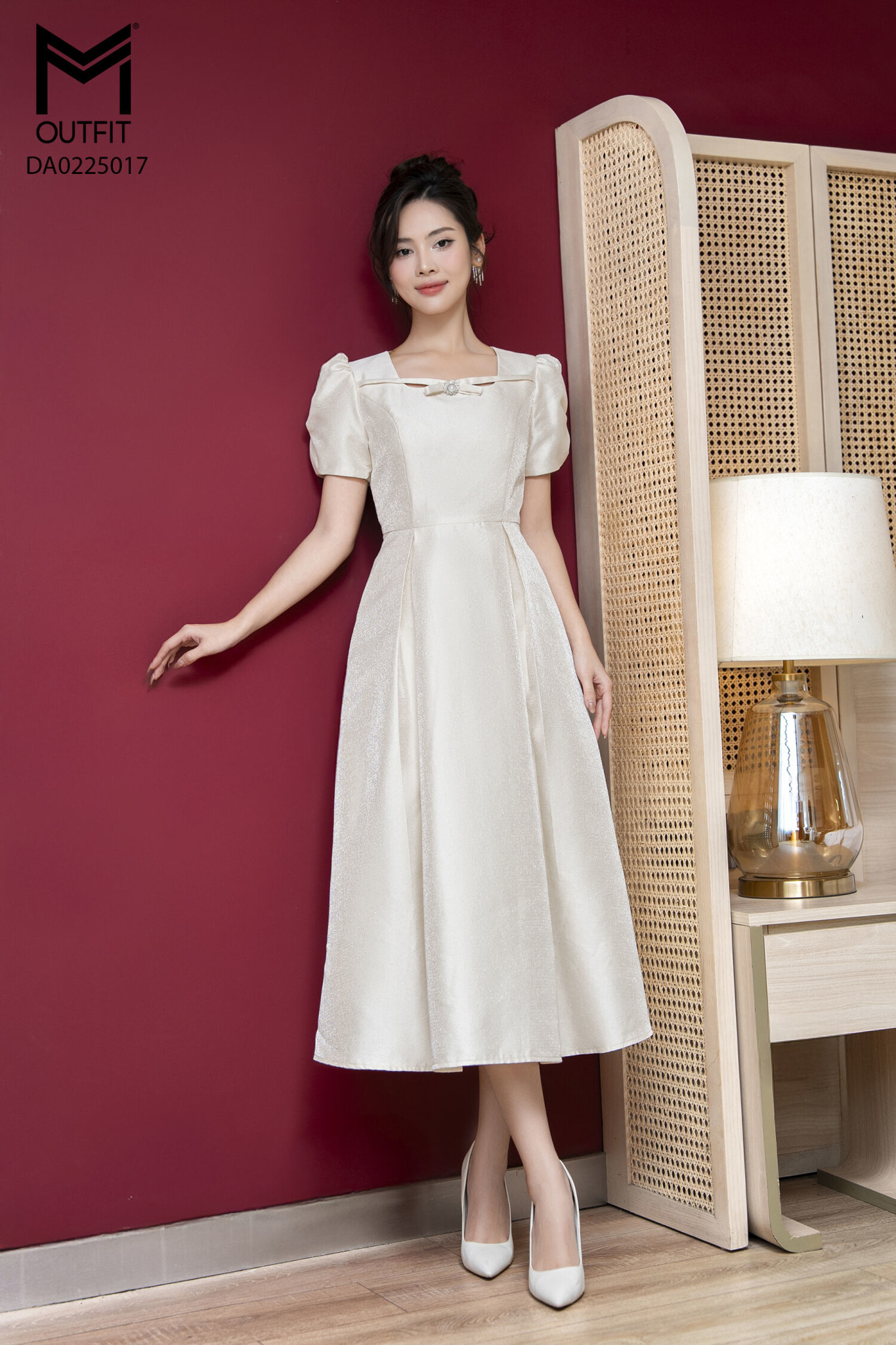 Đầm tiệc cổ đính nơ đá tay xếp ly chụm