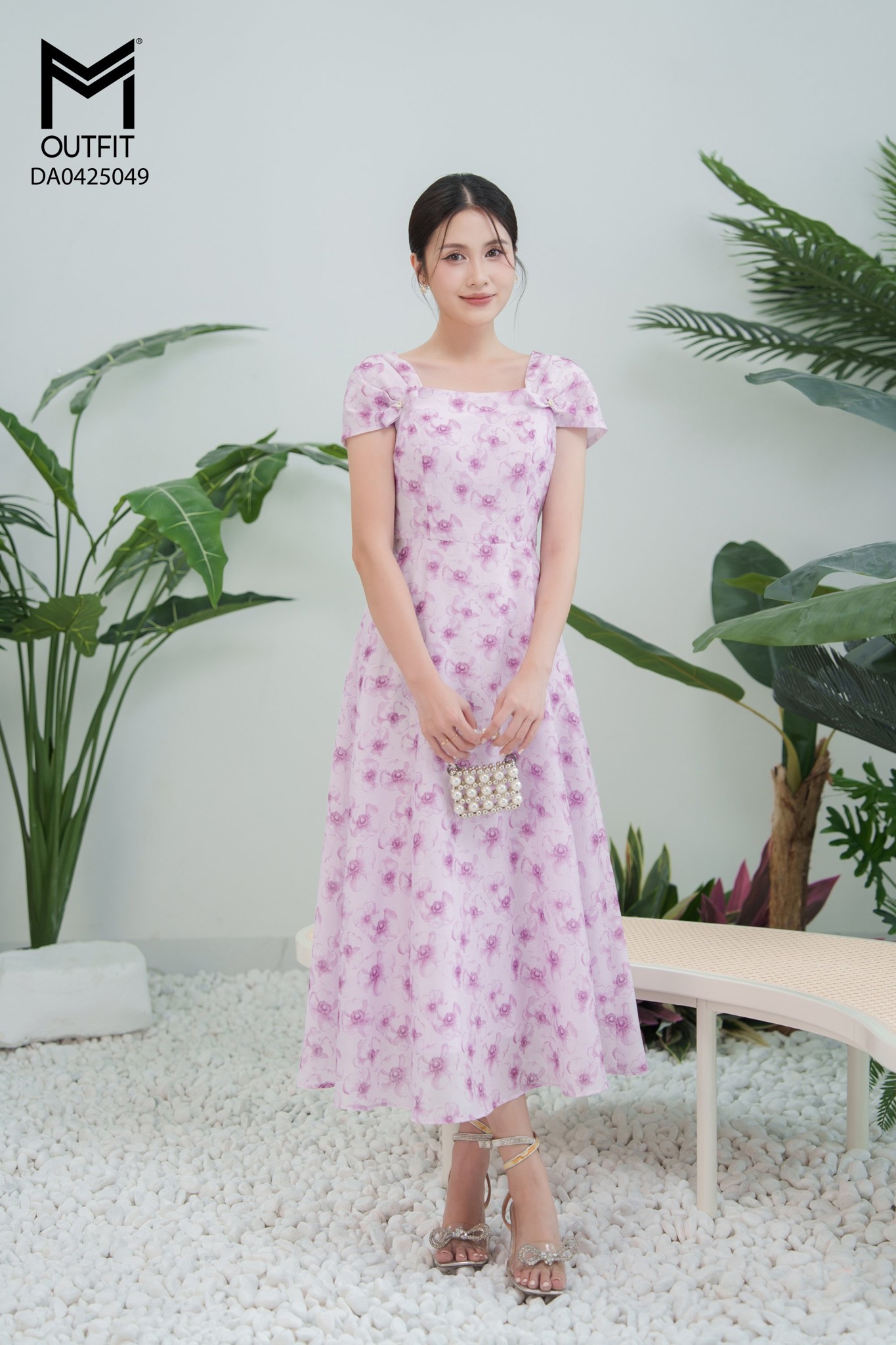 Đầm hoa tay xếp li đính nơ cách điệu hai bên tay