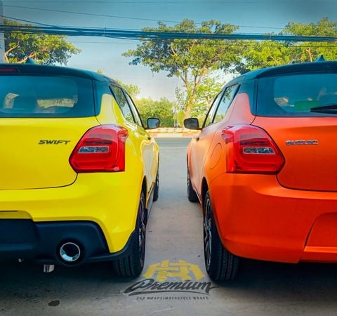 Cặp đôi Suzuki Swift Wrap đổi màu vàng và cam