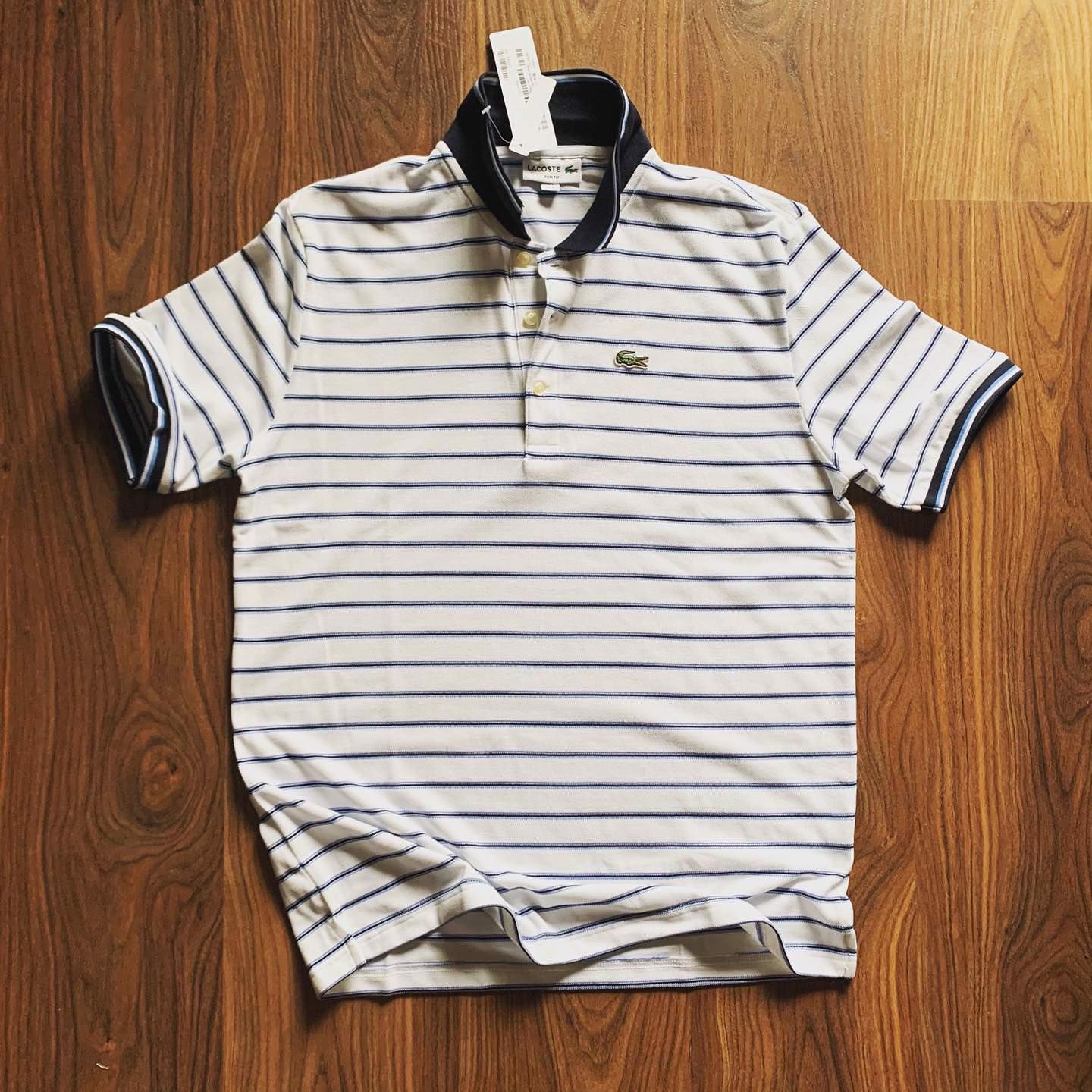 POLO Lacoste kẻ ngang cổ viền