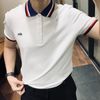 Polo Lacoste viền kẻ đỏ xanh trắng - Trắng