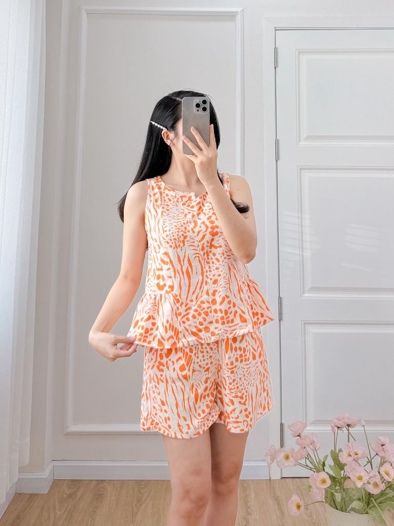 Đồ bộ đùi cổ lệch tà linen vằn cam