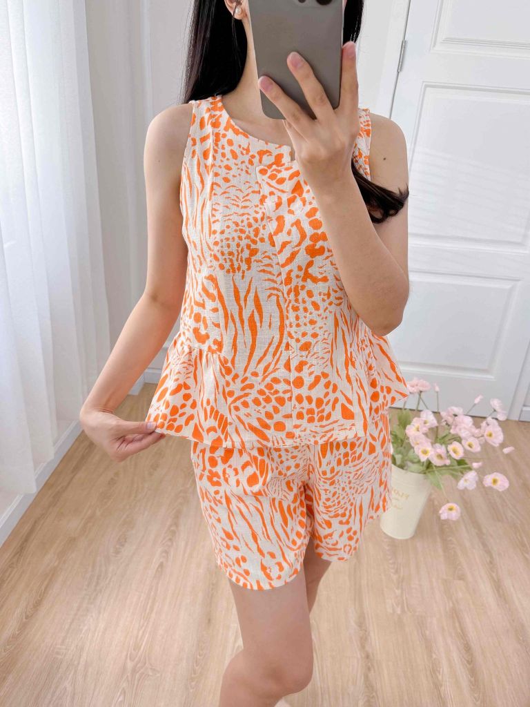Đồ bộ đùi cổ lệch tà linen vằn cam