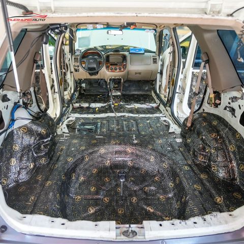 Cách âm sàn xe Ford Escape 2002
