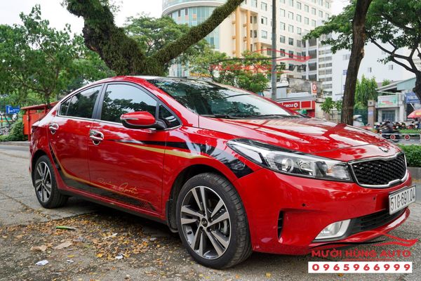 DÁN TEM DECAL HÔNG XE KIA CERATO MÀU ĐỎ TẠI TP.HCM