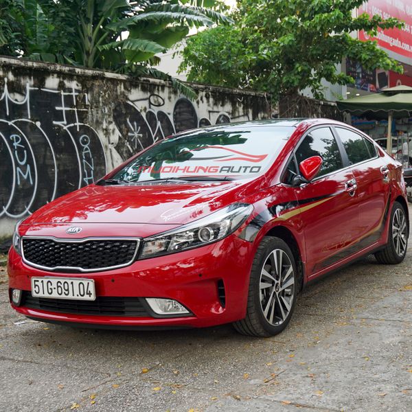 DÁN TEM DECAL HÔNG XE KIA CERATO MÀU ĐỎ TẠI TP.HCM