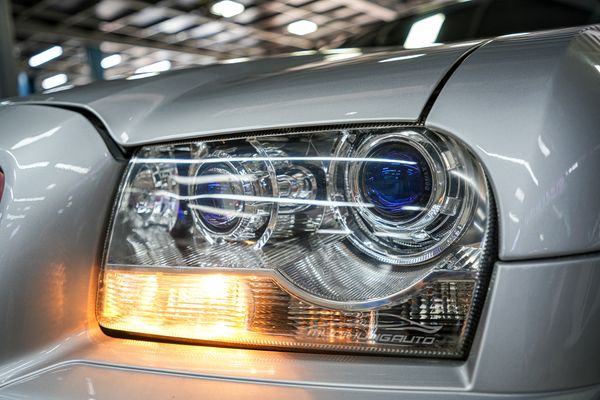 Độ 4 Bi LED Domax X-LED Pro Chính Hãng Aozoom Cho Xe Chrysler