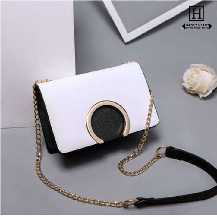 Túi đeo chéo nữ nắp khuyết tròn