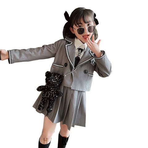 Bộ váy bé gái xếp ly cùng áo vest phong cách học sinh Hàn Quốc