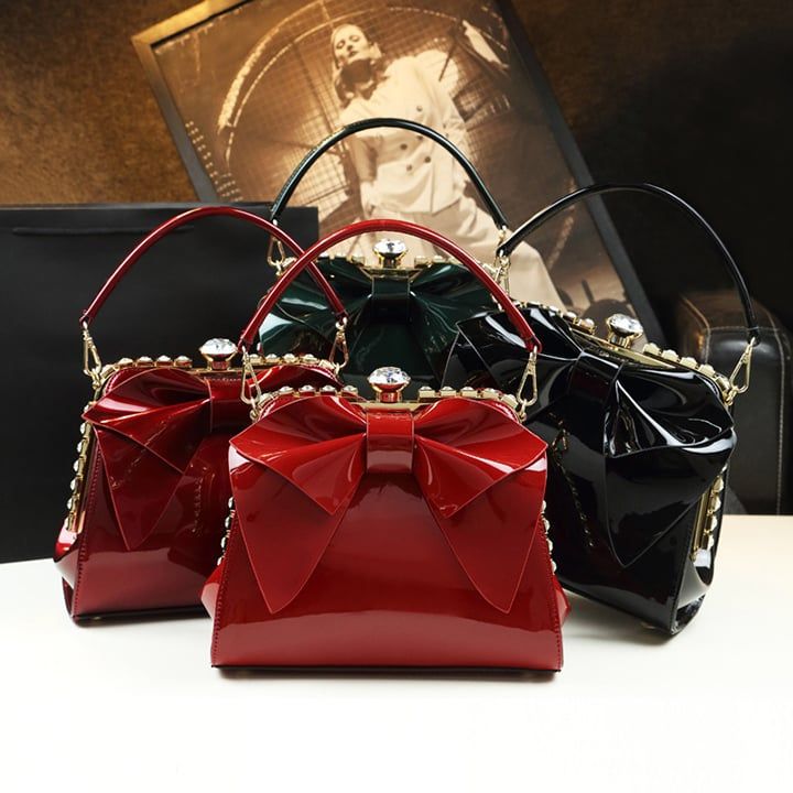 Túi nữ dáng vuông gắn nơ đính đá